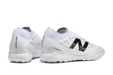 Chuteira New Balance Tekela Elite V5 Society