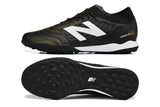 Chuteira New Balance Tekela Elite V5 Society