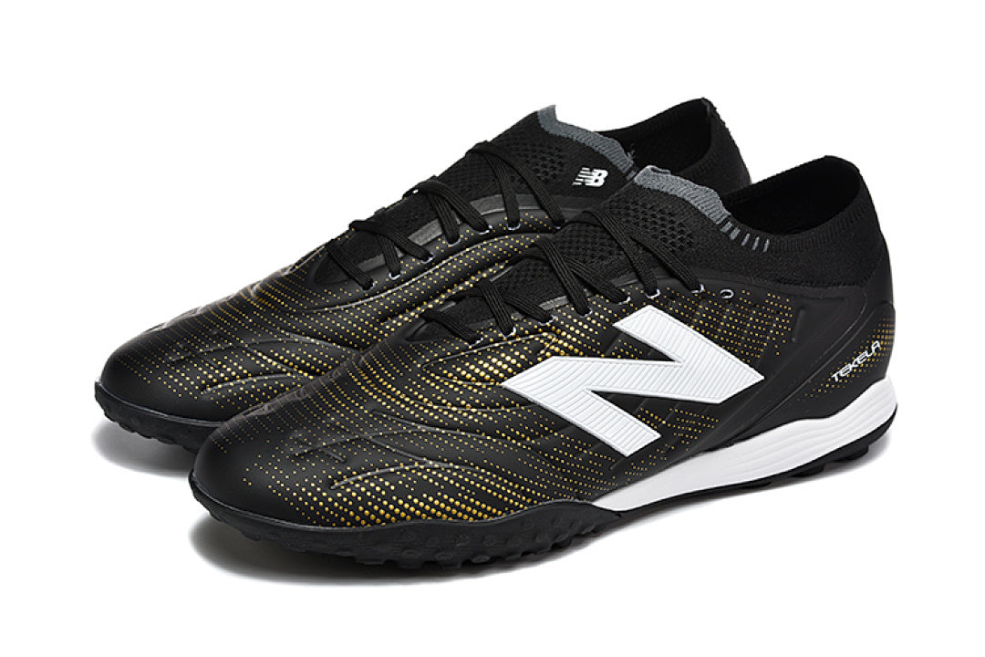 Chuteira New Balance Tekela Elite V5 Society