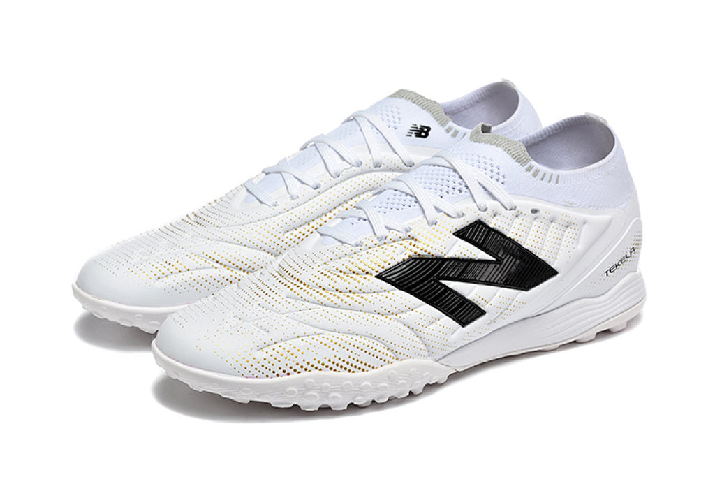 Chuteira New Balance Tekela Elite V5 Society